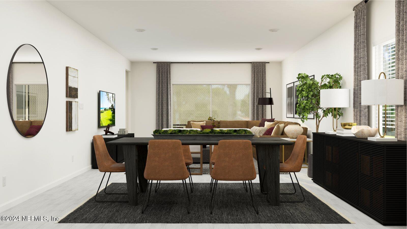 117 Round Robin Run St. Johns, FL 32259 - Photo 5 of 17 a view of a dining room with furniture and a potted plant