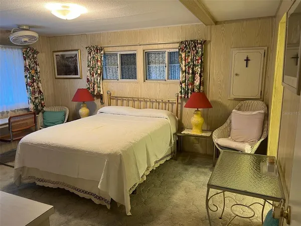 a view of front door and bedroom