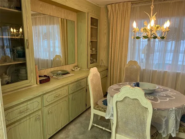 a bathroom with a sink vanity granite and a mirror