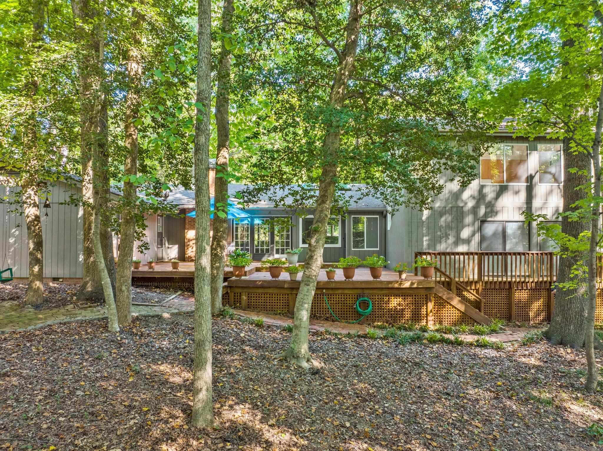4505 Eliot Place Raleigh, NC 27609 - Photo 43 of 51 Another view of the back of the house with large deck. Exterior Back