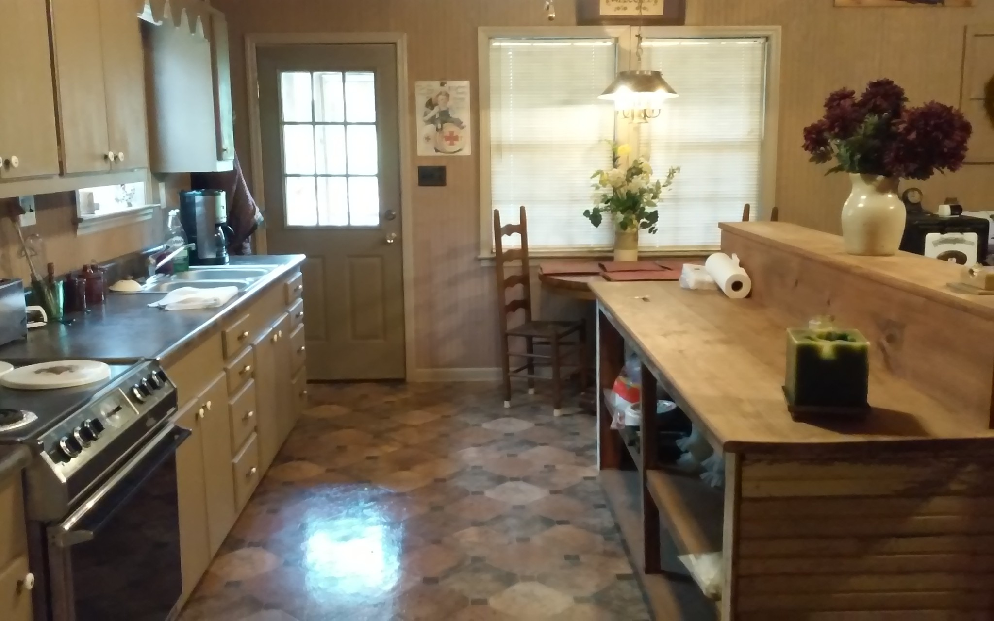 8200 Bethel Road Prospect, TN 38477 - Photo 25 of 50 a kitchen with sink cabinets and window