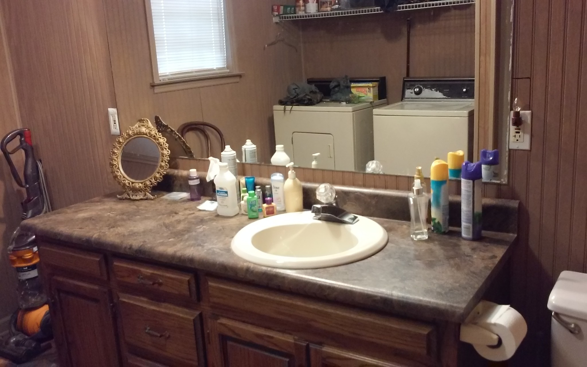 8200 Bethel Road Prospect, TN 38477 - Photo 33 of 50 a bathroom with a granite countertop sink a toilet and a mirror