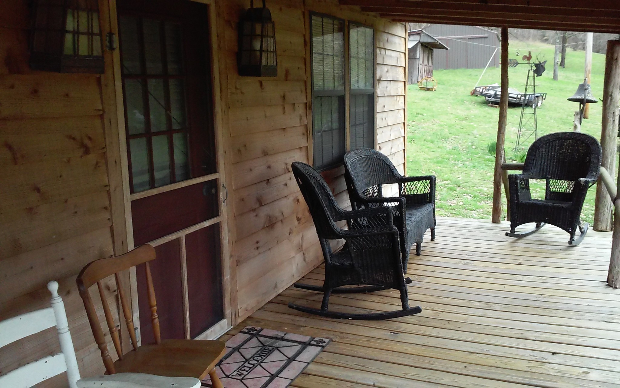 8200 Bethel Road Prospect, TN 38477 - Photo 4 of 50 a view of a deck with chair and table