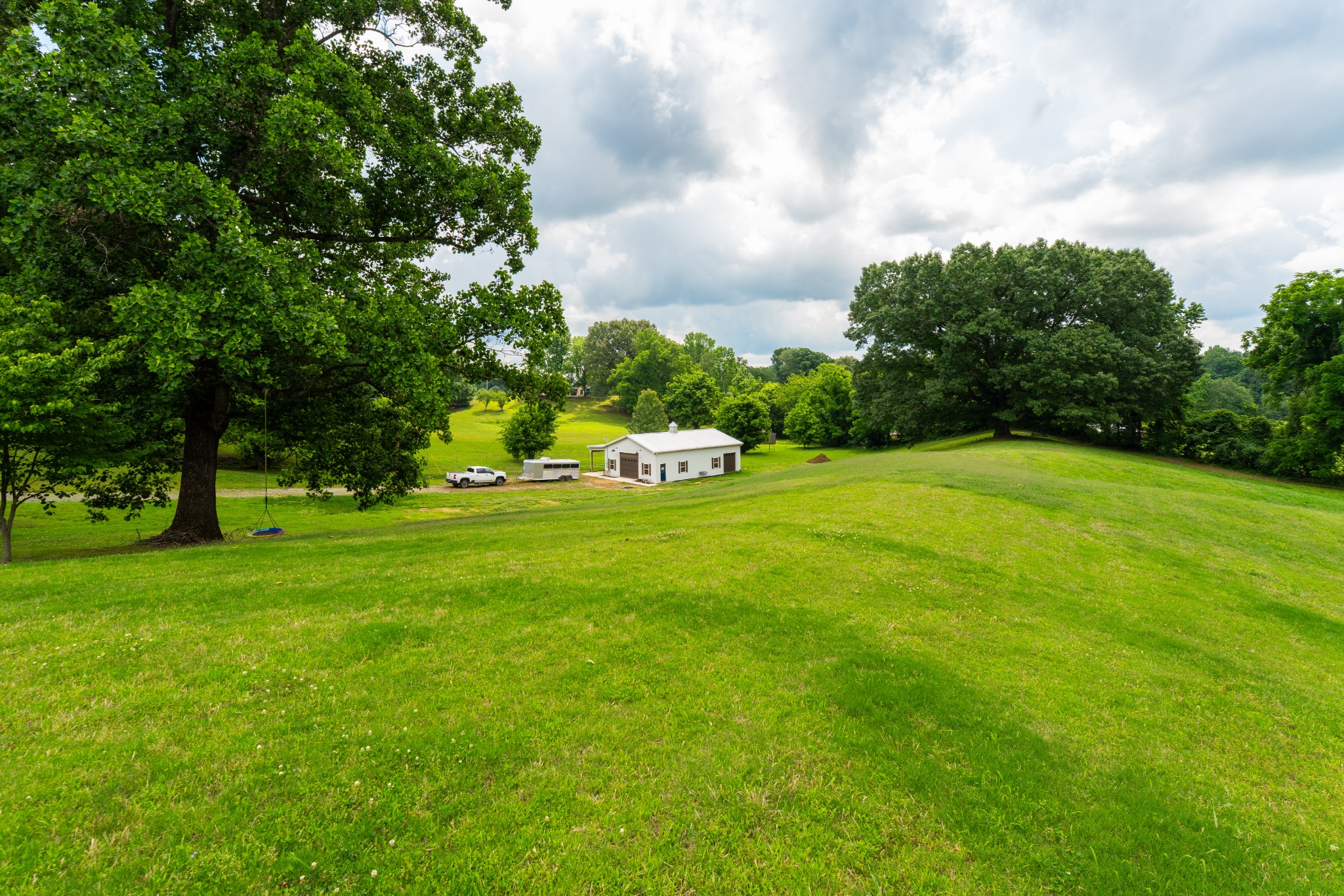 1015 Kelly Road Dyersburg, TN 38024 - Photo 40 of 41 a big yard with lots of green space
