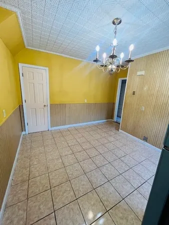 a view of a room with painted walls