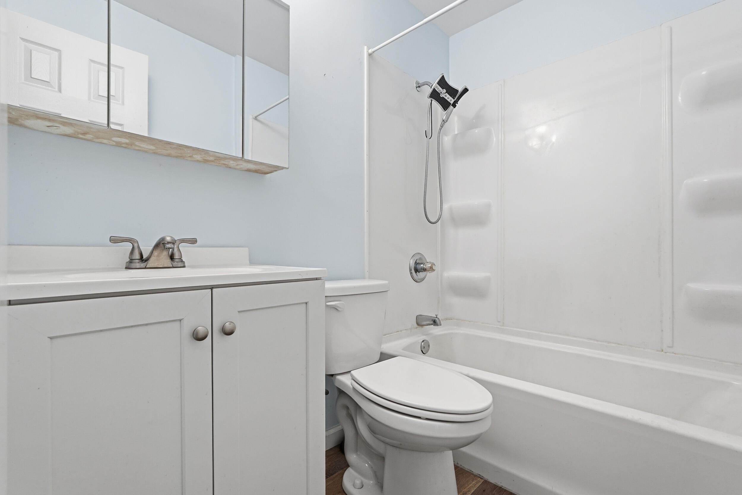 319 Michigami Trail Chesterton, IN 46304 - Photo 16 of 19 a bathroom with a sink a toilet and shower