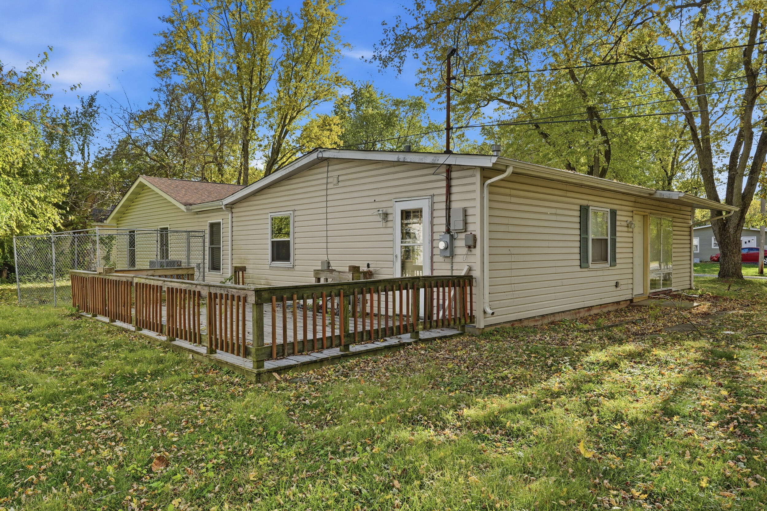 319 Michigami Trail Chesterton, IN 46304 - Photo 18 of 19 a view of a house with a yard