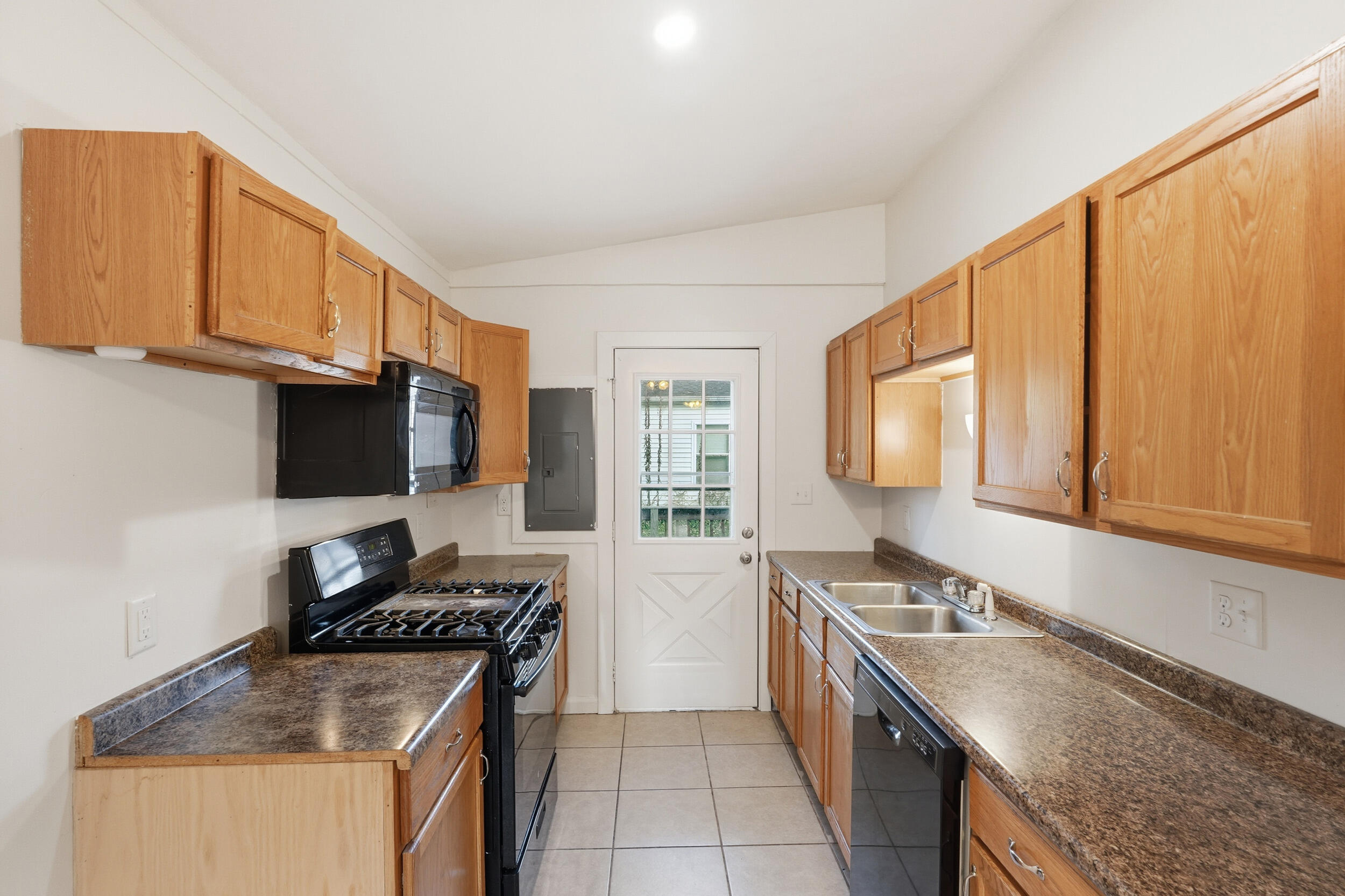 319 Michigami Trail Chesterton, IN 46304 - Photo 8 of 19 a kitchen that has a sink and a stove