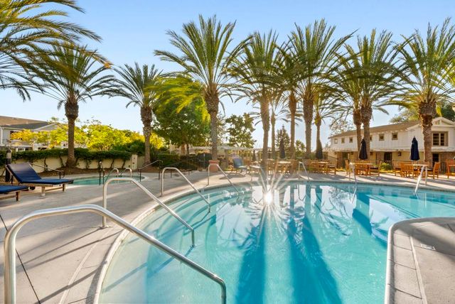 a view of a golf course with a lake