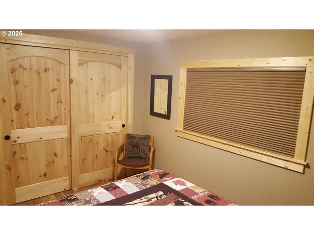 a black and white photo of a living room