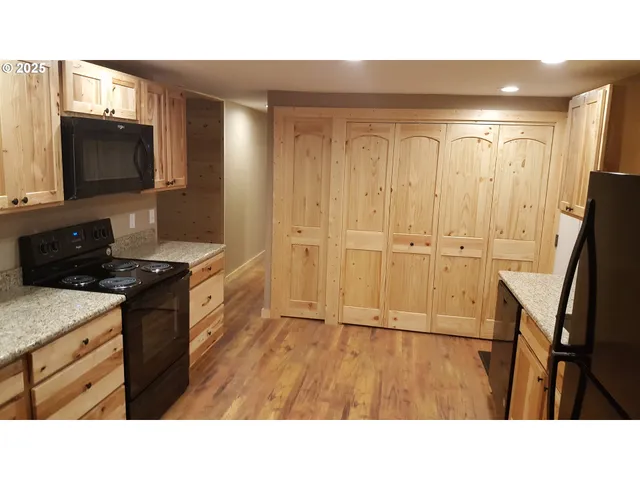 a bathroom with a sink a mirror and a bathtub