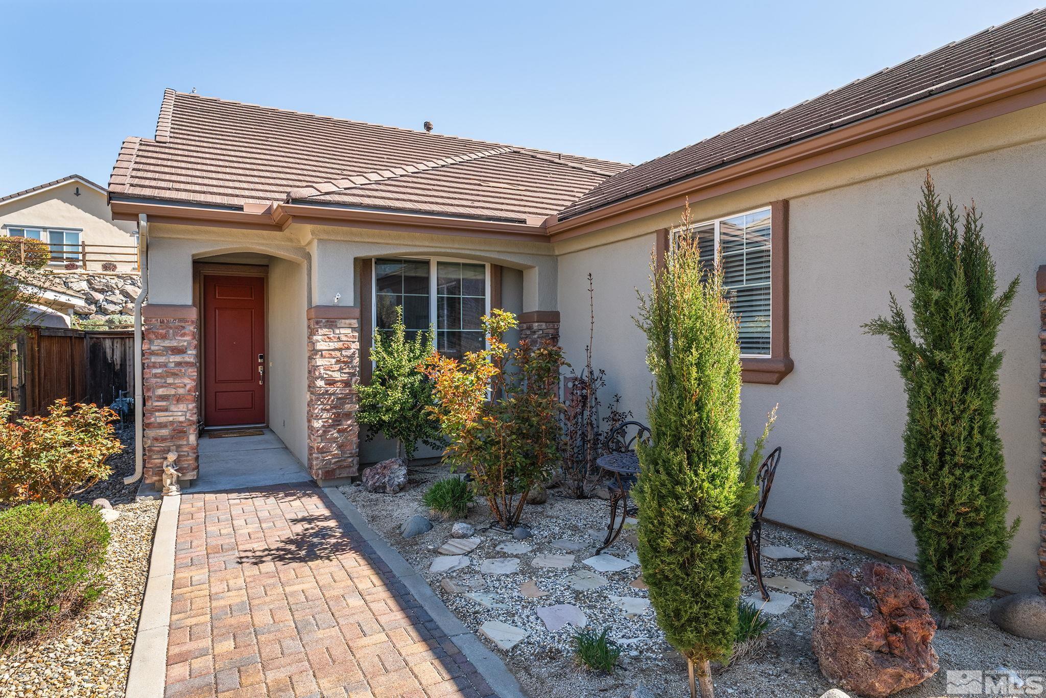 1190 Meridian Ranch Drive Reno, NV 89523 - Photo 3 of 35 a view of a house with potted plants