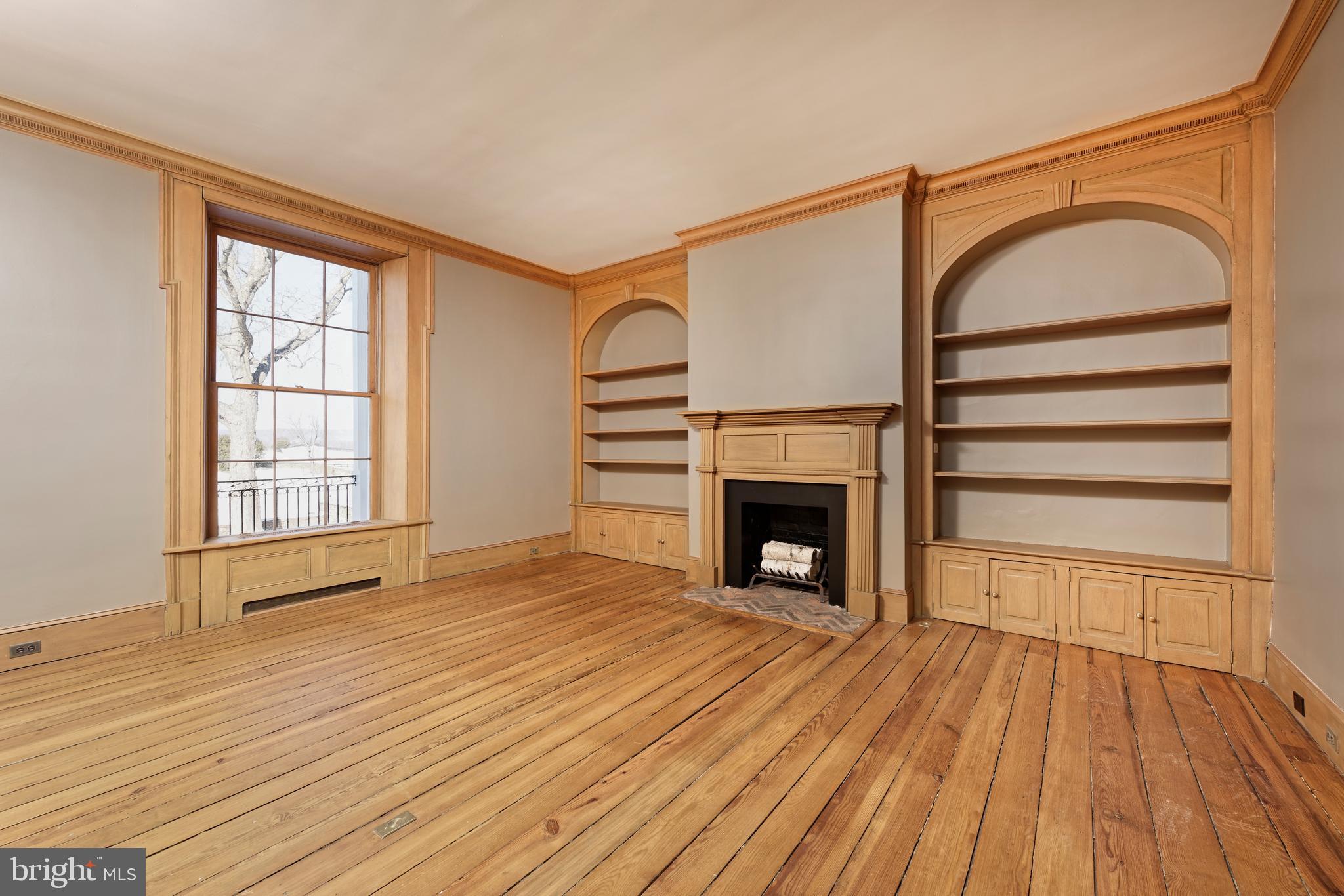 2224 Crenshaw Road Upperville, VA 20184 - Photo 12 of 50 Library with built-ins and fireplace