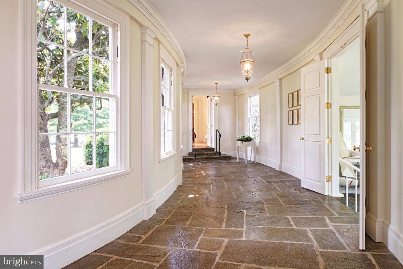 2224 Crenshaw Road Upperville, VA 20184 - Photo 14 of 50 Flagstone gallery leads to north wing of the house