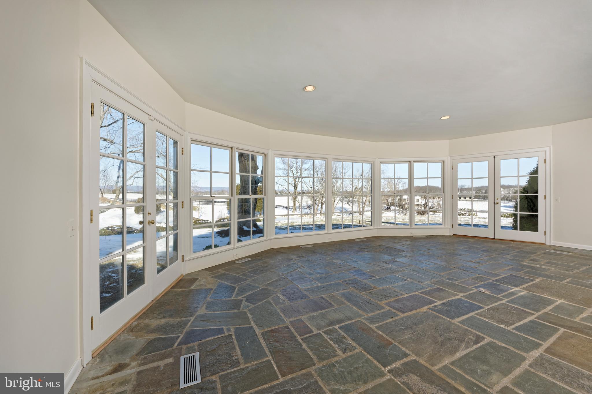 2224 Crenshaw Road Upperville, VA 20184 - Photo 15 of 50 Light filled sunroom with stunning westward views