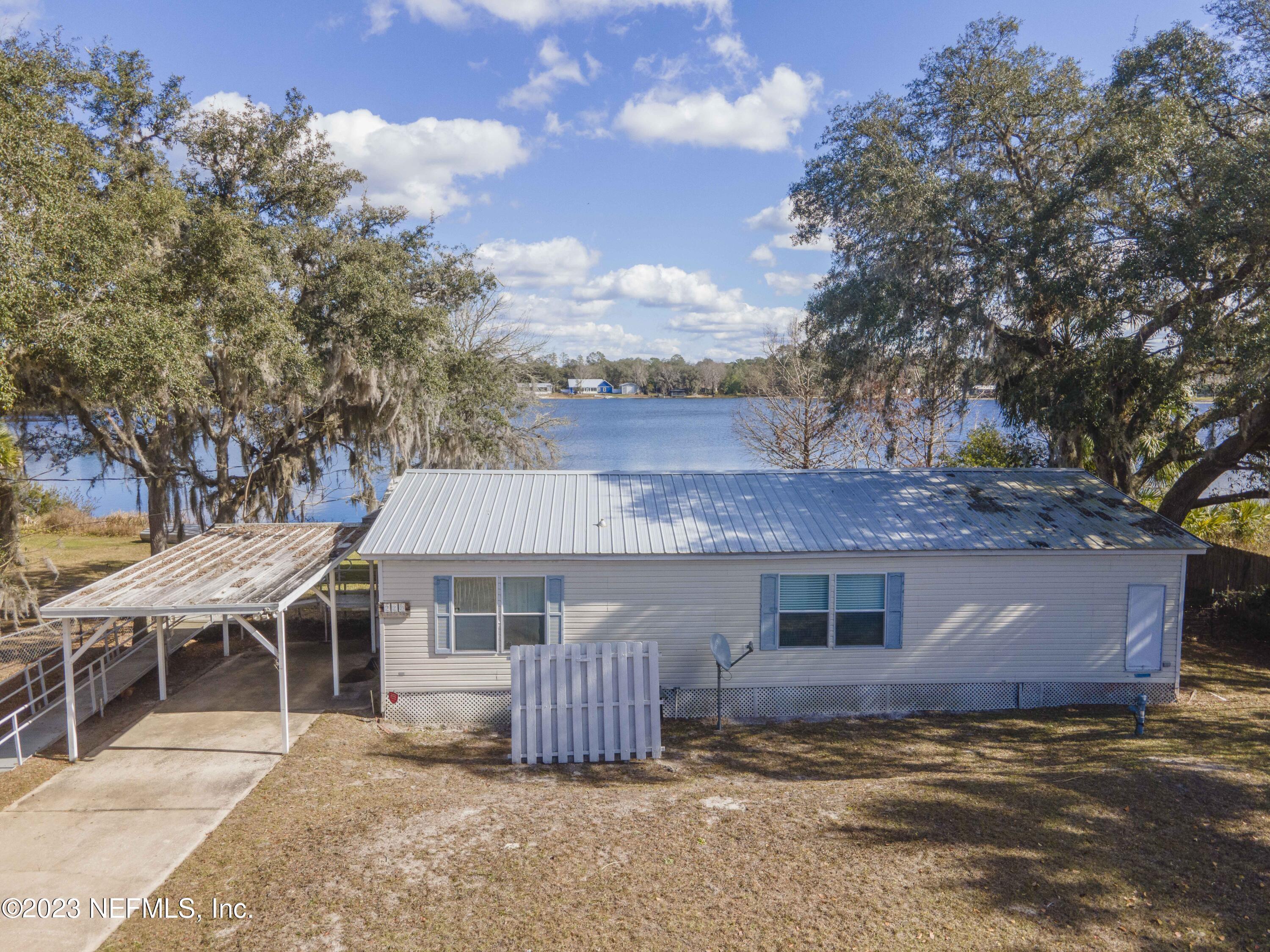 222 Kitty Avenue Interlachen, FL 32148 - Photo 1 of 34 front view of a house with a stove