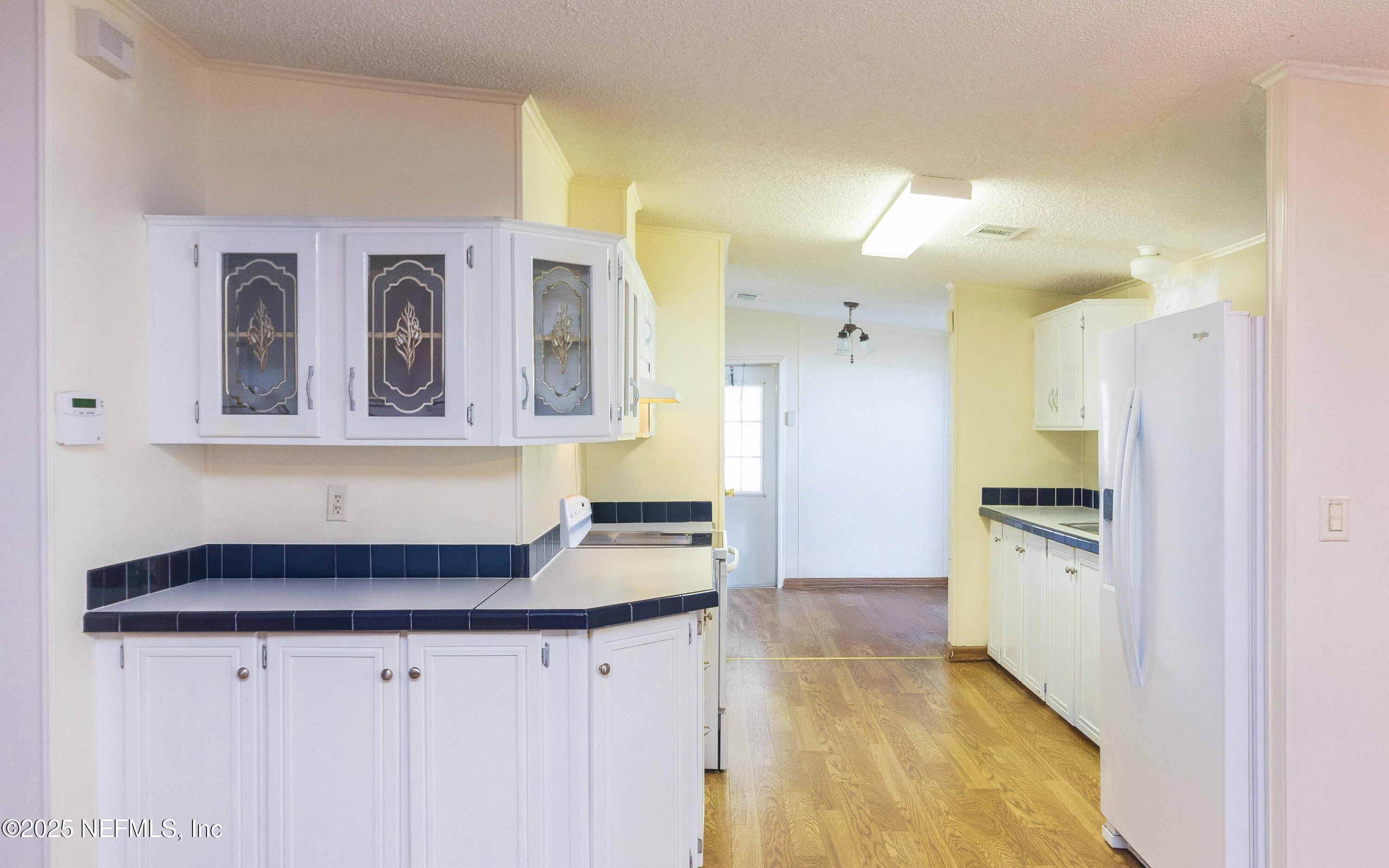 222 Kitty Avenue Interlachen, FL 32148 - Photo 20 of 34 a kitchen with granite countertop a sink and a stove