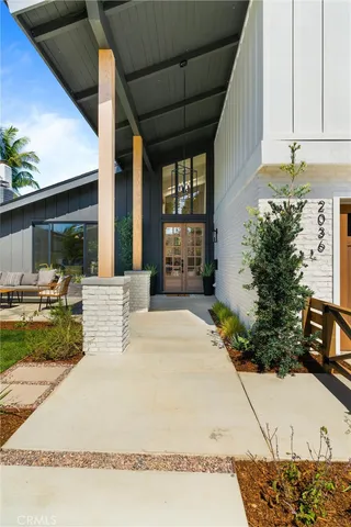 a view of a backyard of the house