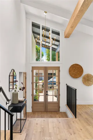 a view of living room with furniture and window