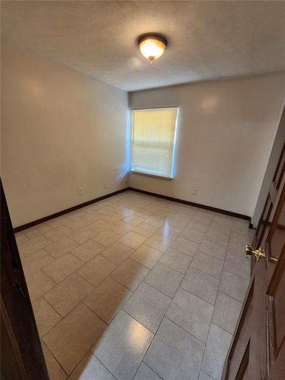 3186 Quince Tree Lane Decatur, GA 30034 - Photo 14 of 24 a view of an empty room with a window