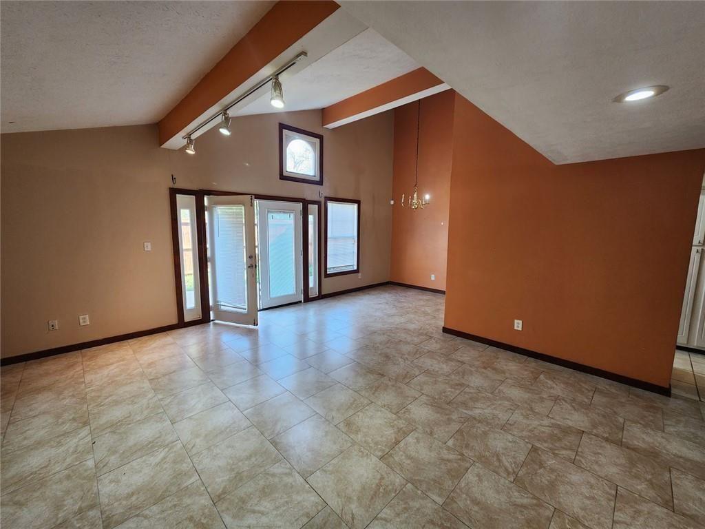 3186 Quince Tree Lane Decatur, GA 30034 - Photo 4 of 24 a view of an empty room with windows
