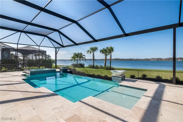 a view of a swimming pool with a patio