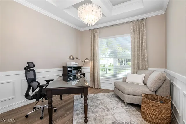 a workspace with furniture and a window