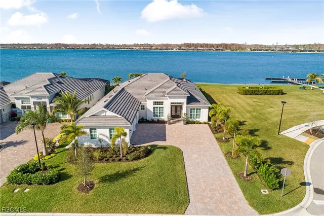 an aerial view of a house with outdoor space