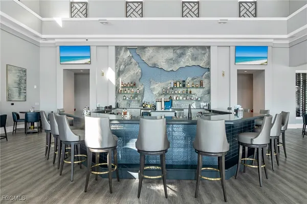 a view of a house with swimming pool and a yard