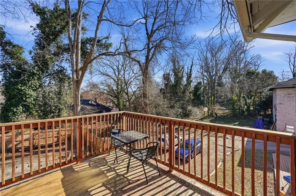1420 Sylvan Road Southwest Atlanta, GA 30310 - Photo 18 of 43 a view of balcony with wooden fence and floor