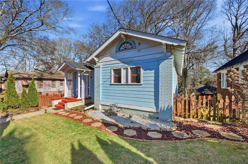1420 Sylvan Road Southwest Atlanta, GA 30310 - Photo 3 of 51 a front view of house with yard