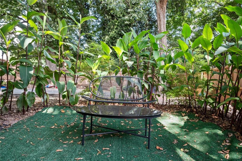 1420 Sylvan Road Southwest Atlanta, GA 30310 - Photo 41 of 51 a view of a backyard with table and chairs