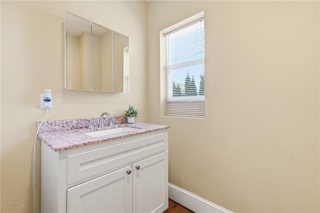 1420 Sylvan Road Southwest Atlanta, GA 30310 - Photo 8 of 51 a sink and dishwasher with a vanity