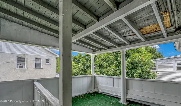 a view of backyard with green space