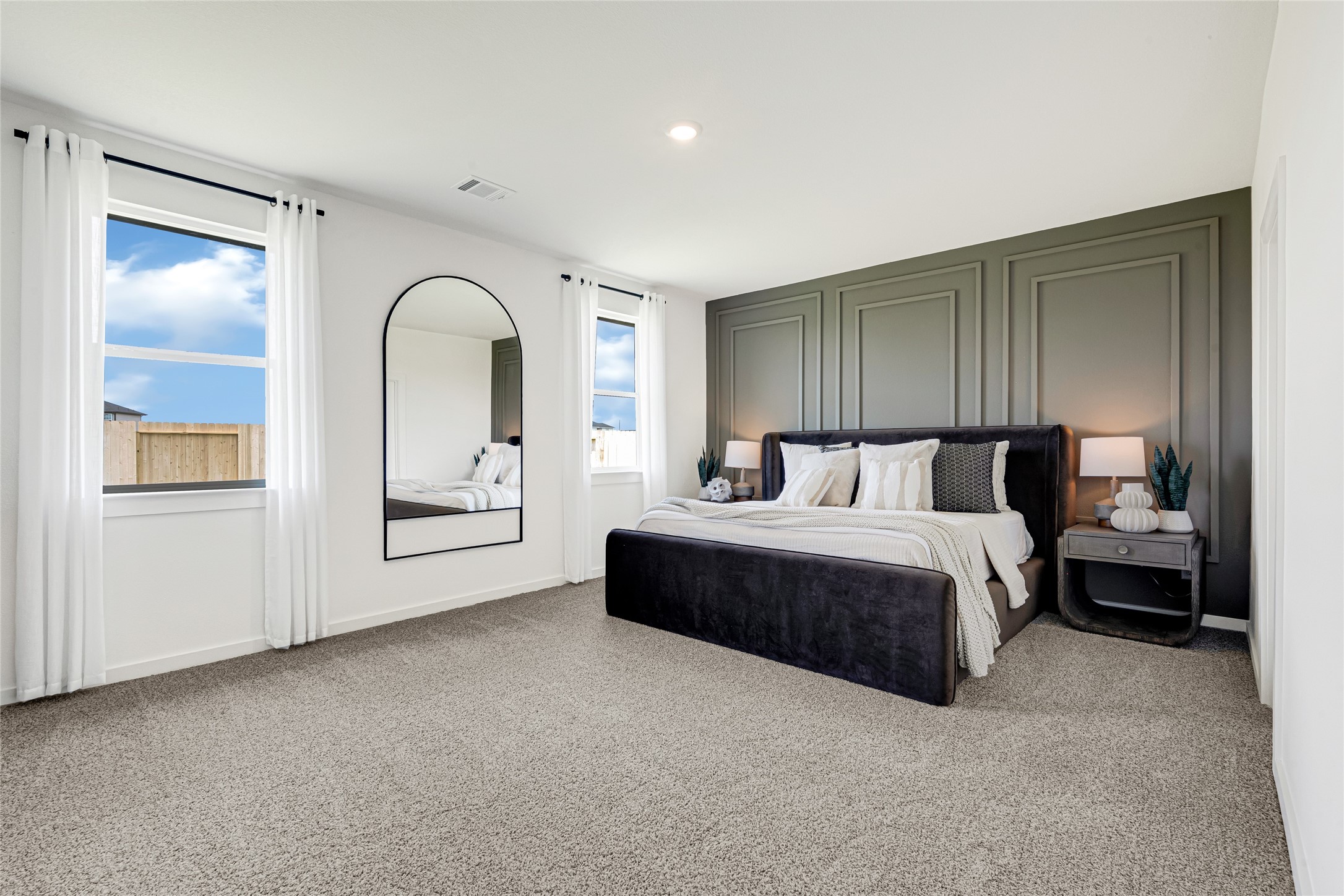 6204 Brookhaven Street Rosenberg, TX 77469 - Photo 27 of 33 a spacious bedroom with a bed and a cabinets