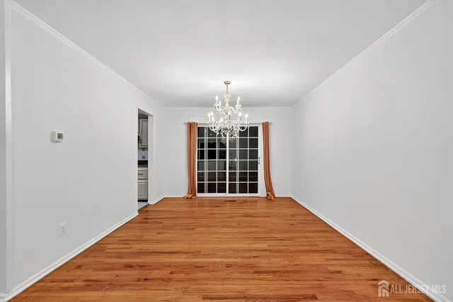 a kitchen with stainless steel appliances granite countertop a refrigerator sink and microwave