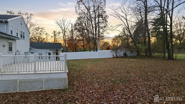 an aerial view of a house with outdoor space