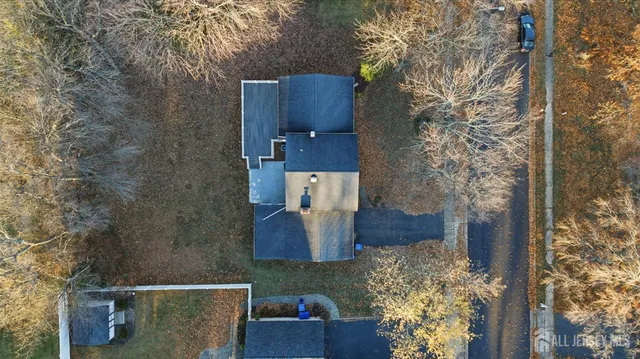 an aerial view of houses with outdoor space