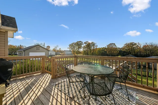 a view of a balcony with chairs