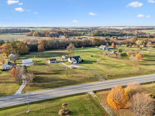 a view of a swimming pool with a lake view