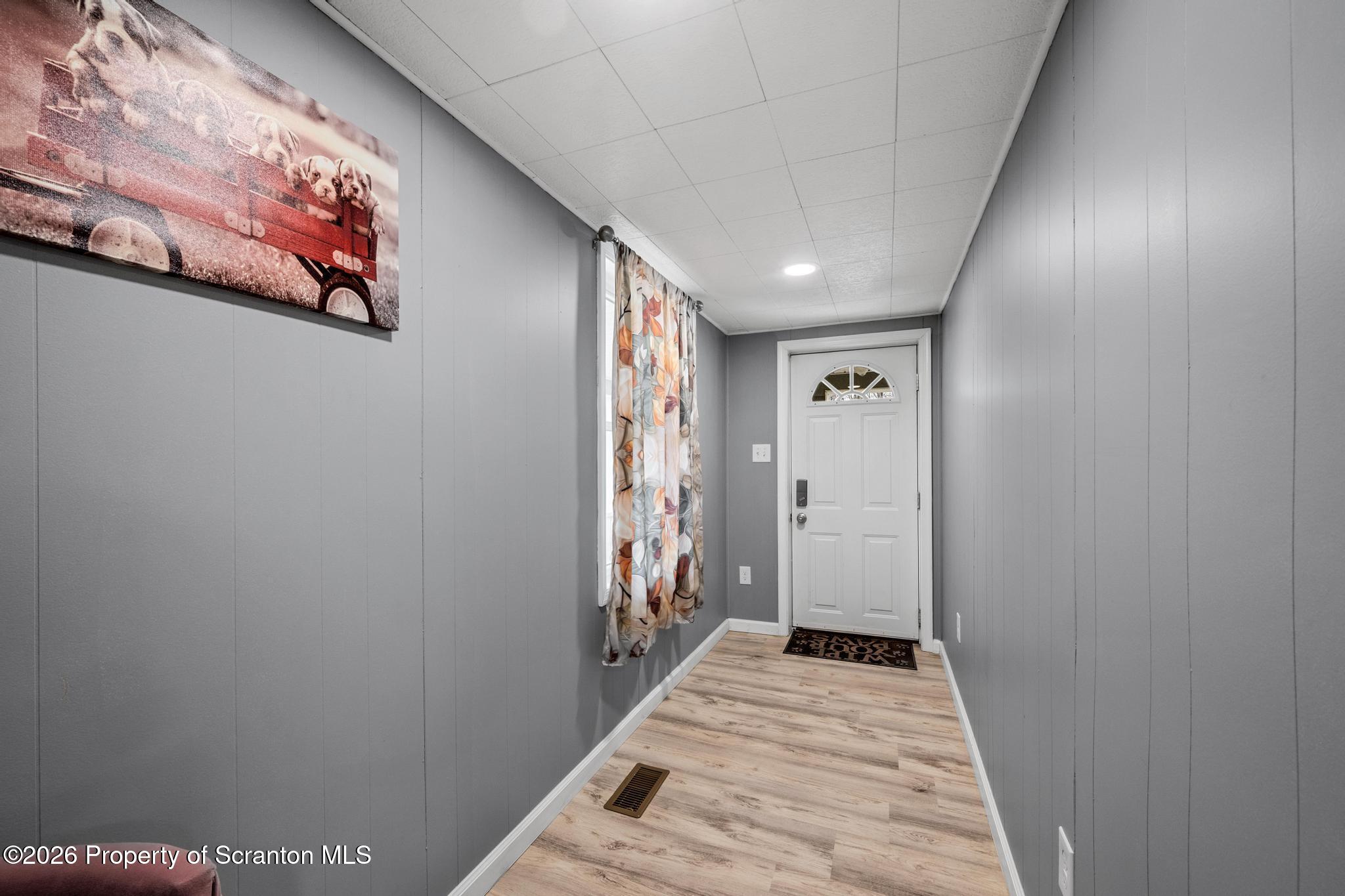 1227 Bennett Street Old Forge, PA 18518 - Photo 14 of 26 a view of a hallway