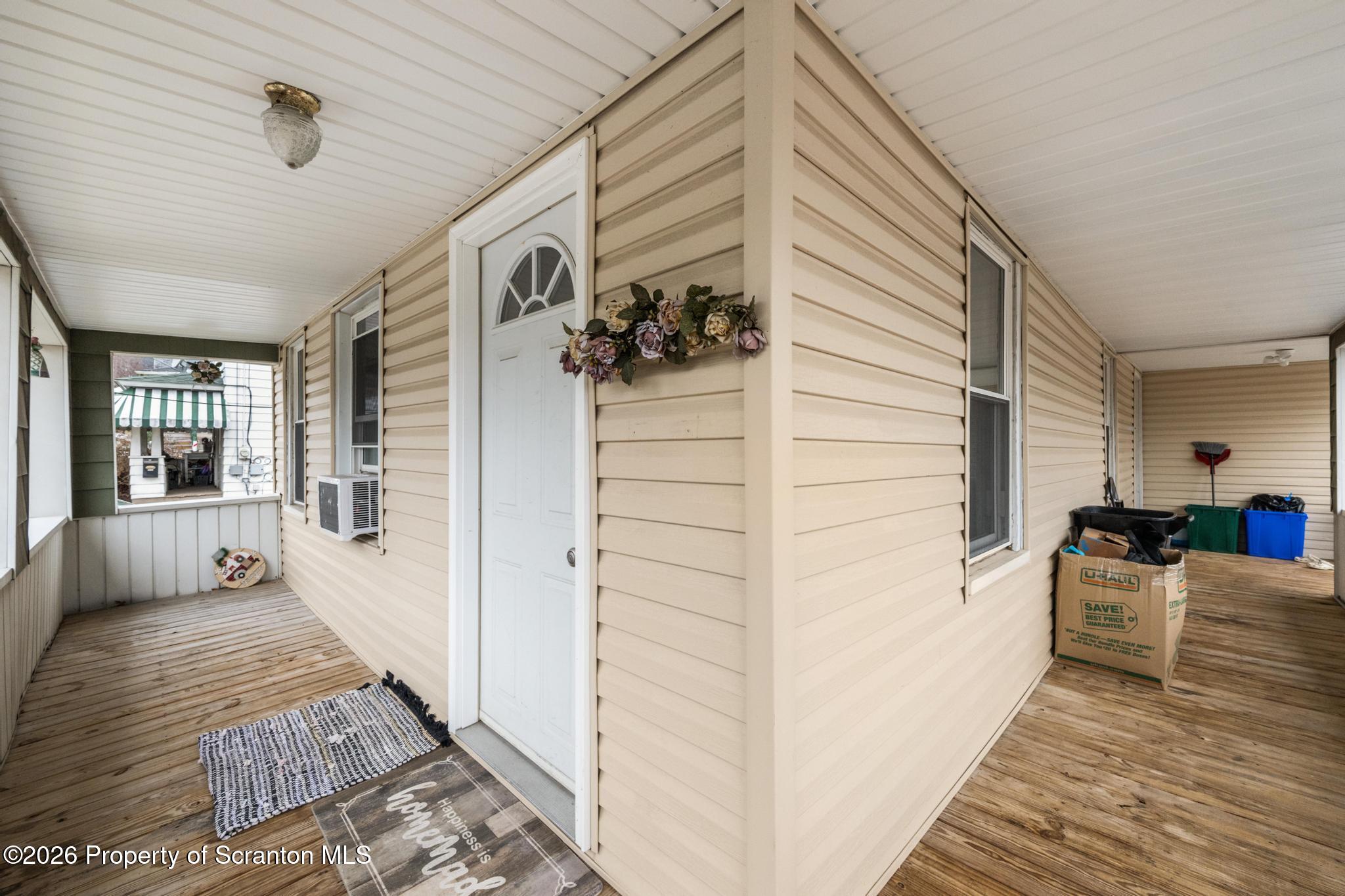 1227 Bennett Street Old Forge, PA 18518 - Photo 23 of 26 a view of a living room with furniture