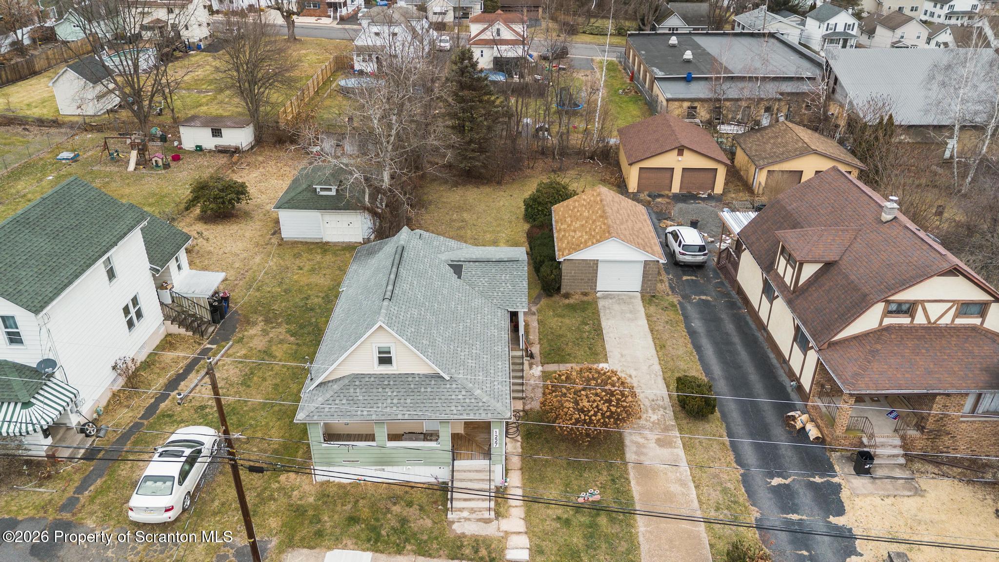 1227 Bennett Street Old Forge, PA 18518 - Photo 25 of 26 an aerial view of residential houses with outdoor space
