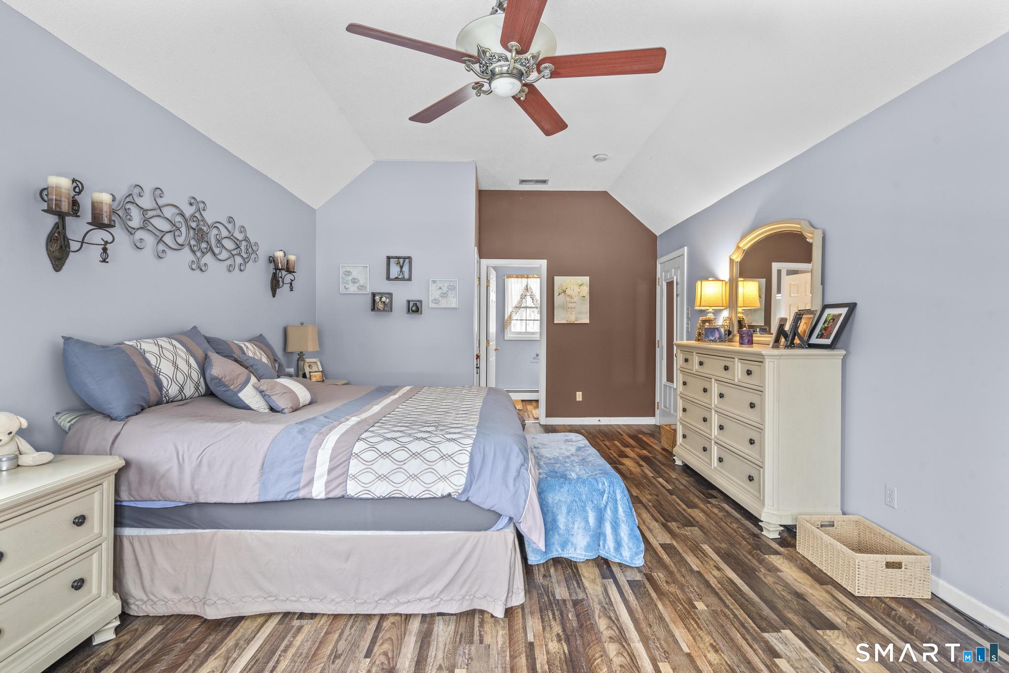 68 Doris Road Bristol, CT 06010 - Photo 22 of 31 a bedroom with a bed and wooden floor