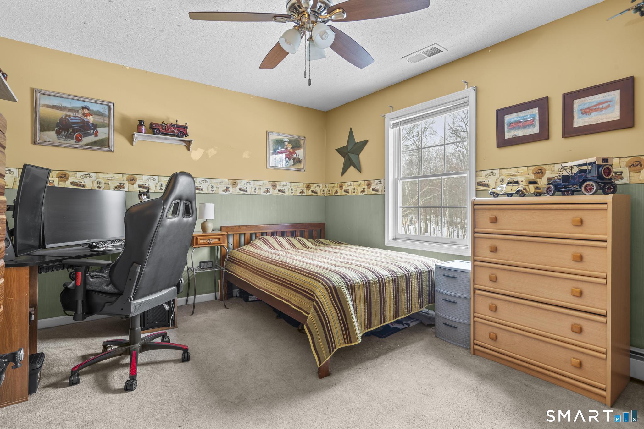 68 Doris Road Bristol, CT 06010 - Photo 25 of 31 a bedroom with a bed and furniture