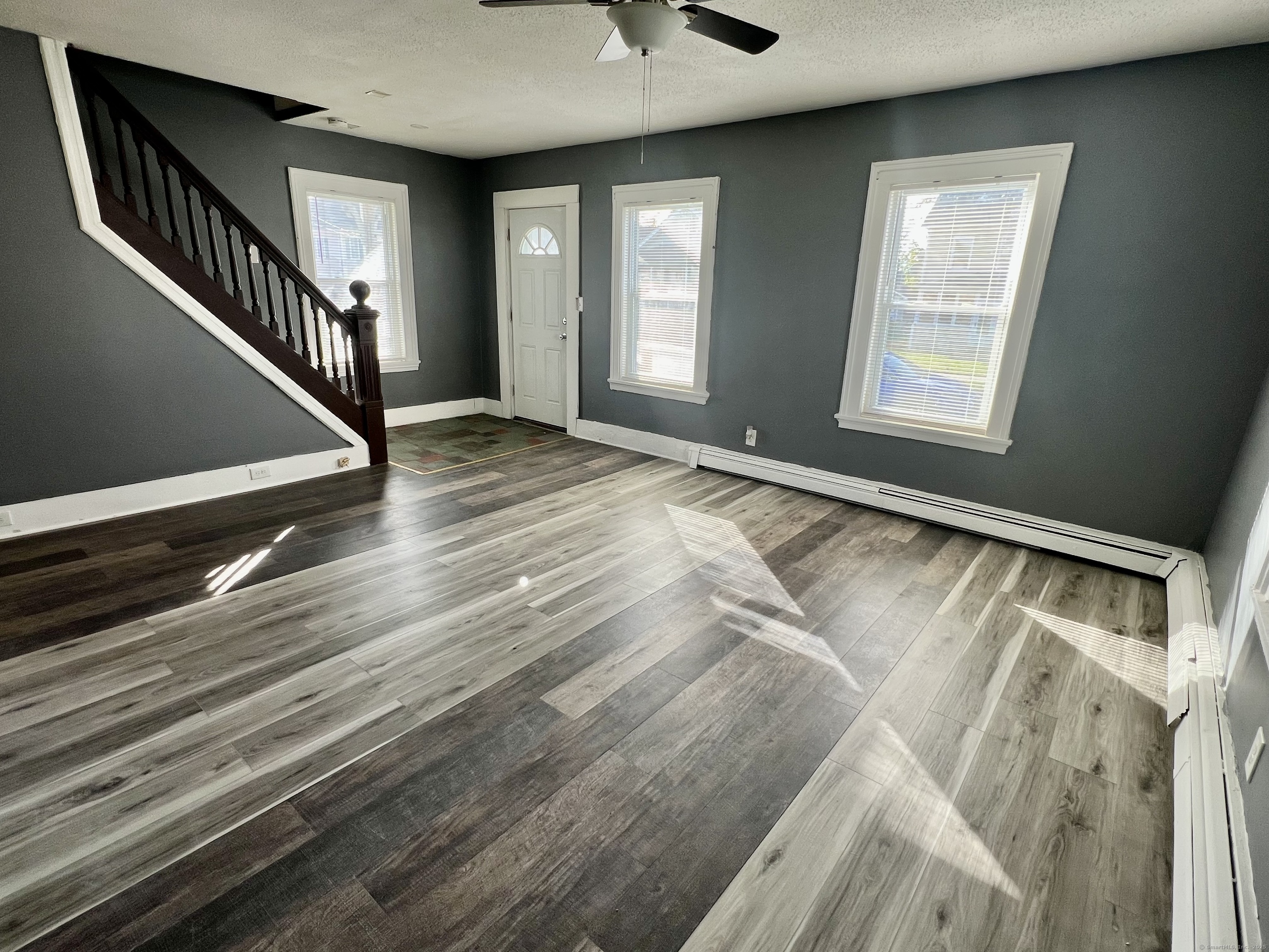 10 Russell Street Enfield, CT 06082 - Photo 5 of 12 a view of an empty room and window