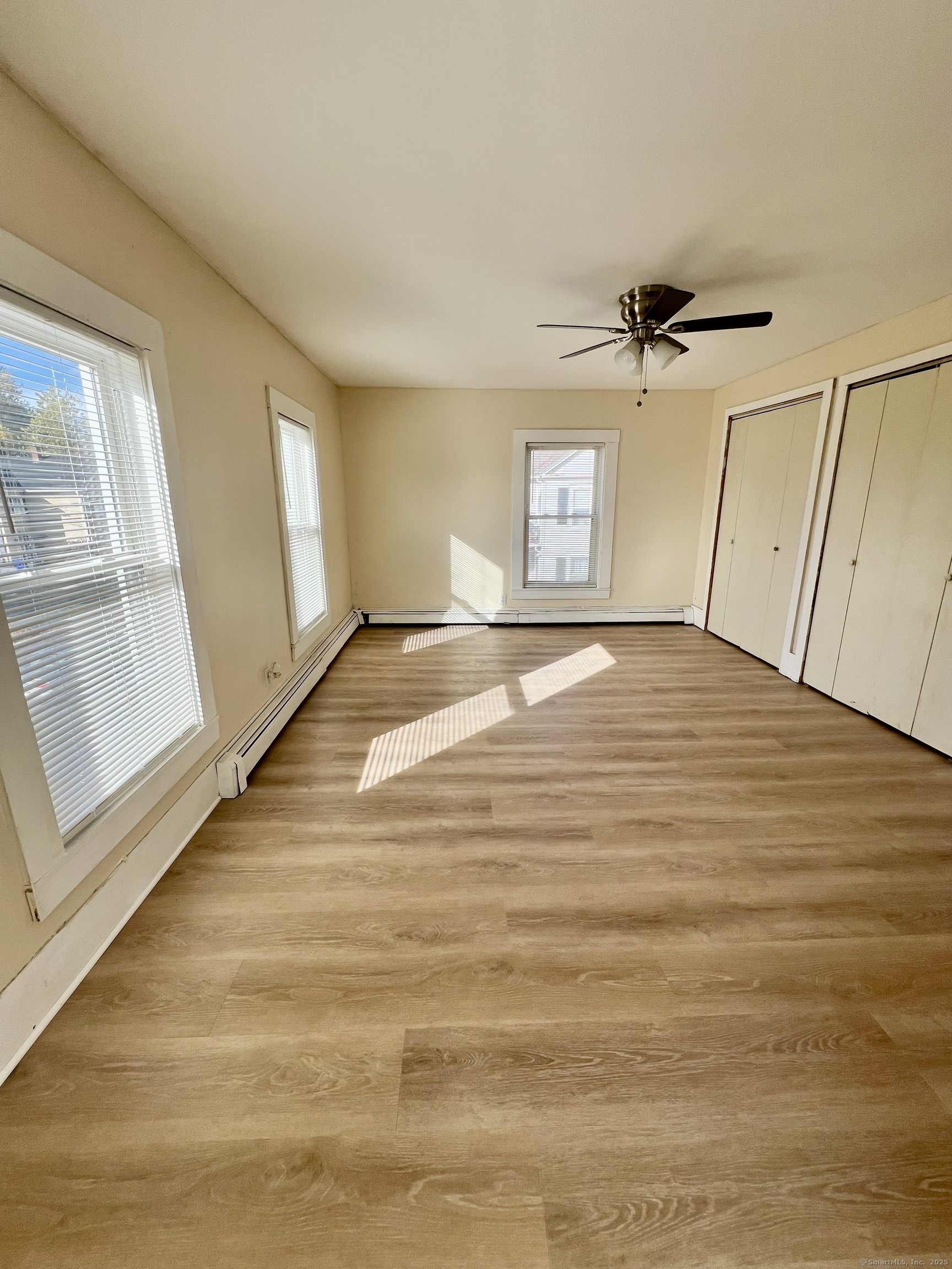 10 Russell Street Enfield, CT 06082 - Photo 8 of 12 a view of an empty room with a window