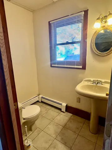 a bathroom with a sink and mirror