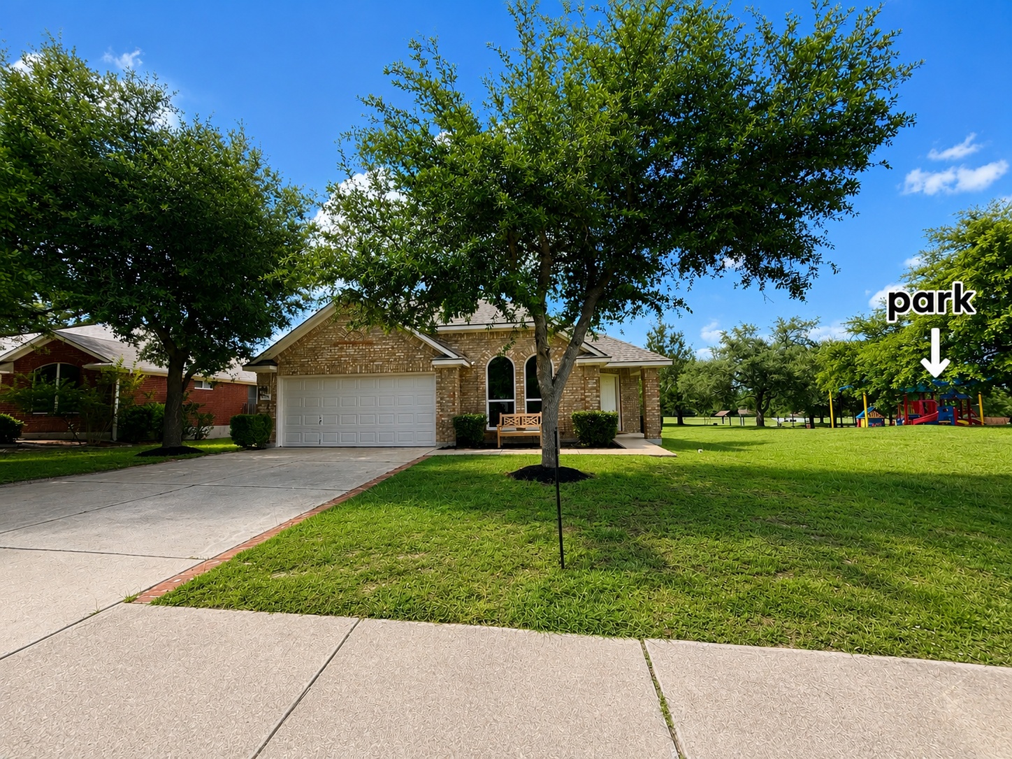 1100 Springbrook Road Pflugerville, TX 78660 - Photo 22 of 23 Image of front of house showing proximity of community park