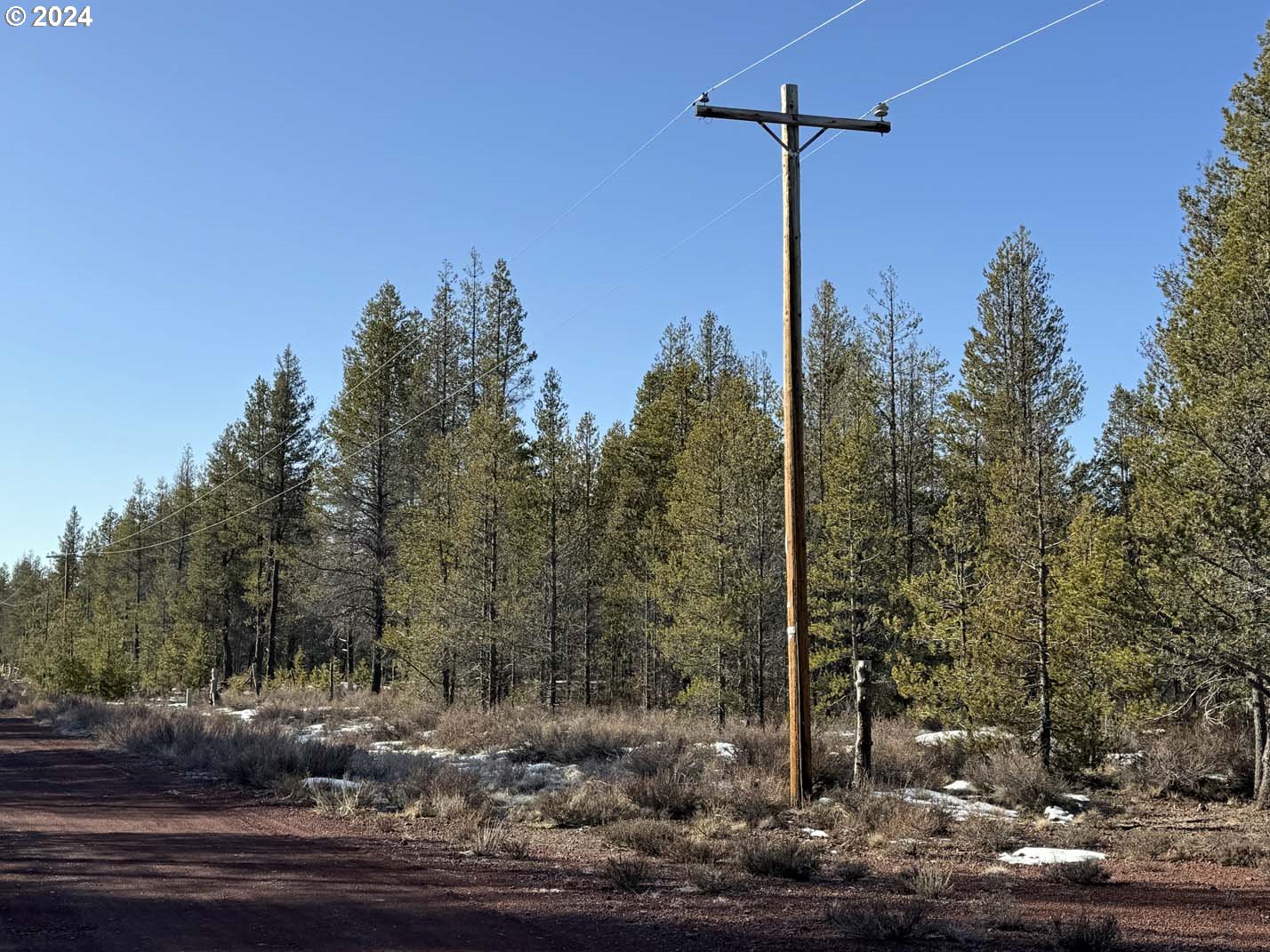 Scott View Drive Chiloquin, OR 97624 - Photo 24 of 24 a street sign on a sidewalk next to a road